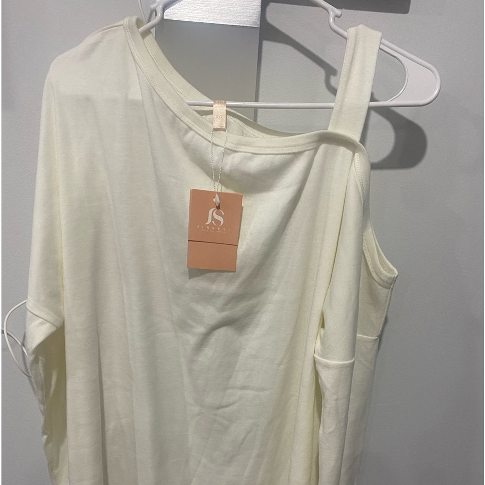 3 blouses black 3x , cream one shoulder 2x and white 2x short Dress  pockets